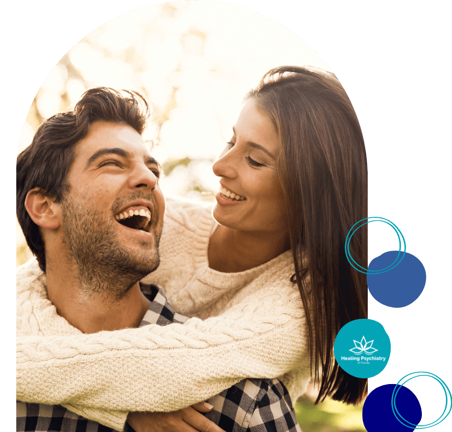 Happy couple embracing in laughter, reflecting the success of individualized depression therapy services in Altamonte Springs.