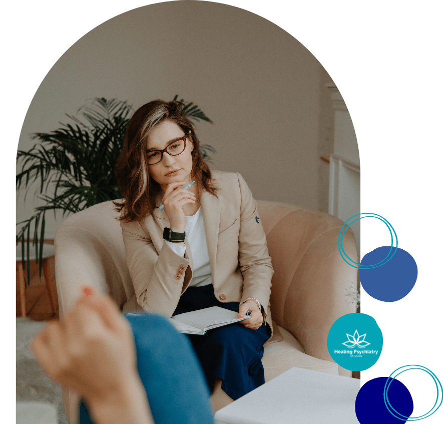 A thoughtful psychiatrist from Oviedo Psychiatric Services is engaged in a session, reflecting the attentive and personalized care offered at Healing Psychiatry of Florida.
