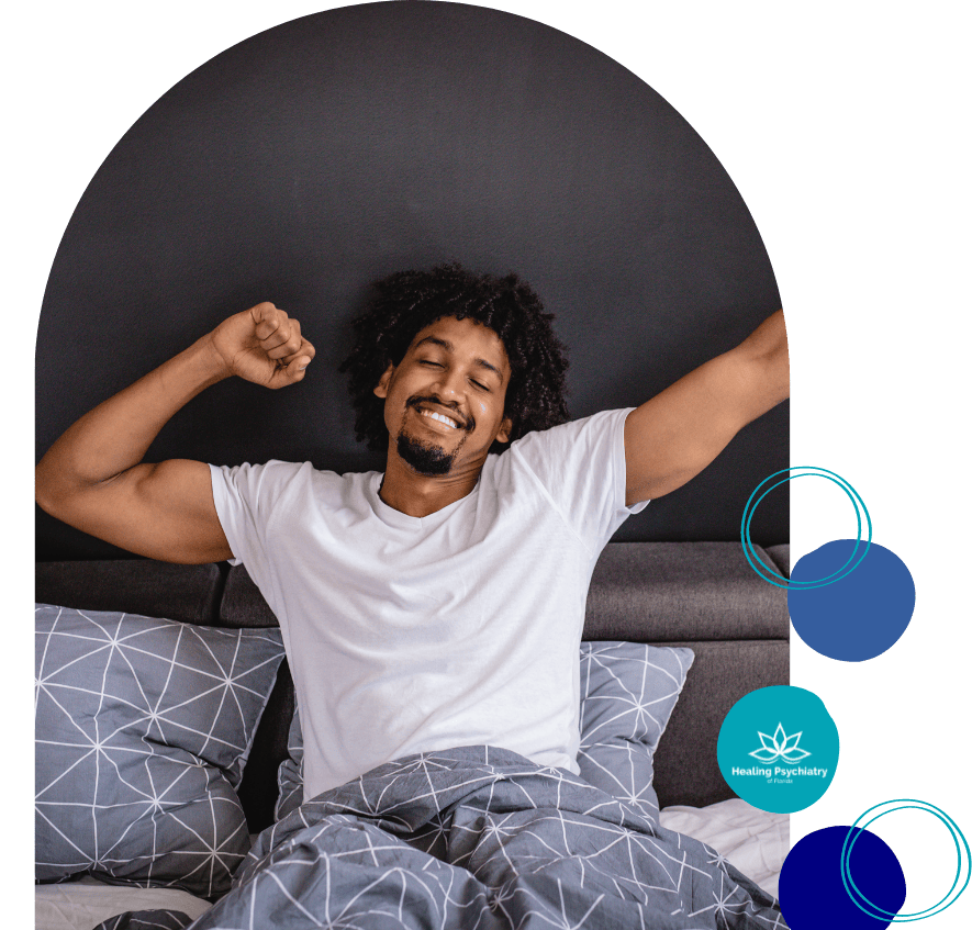 Man waking up refreshed and energized, symbolizing the success of Sleep Disorder Therapy in Altamonte Springs.